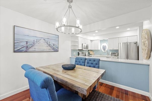Dining room, Interior, Kitchen, Pendant Lights, Recessed Lighting, Stainless Steel Appliances, Wood Texture Flooring