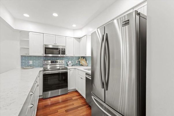 Interior, Kitchen, Recessed Lighting, Stainless Steel Appliances, Wood Texture Flooring