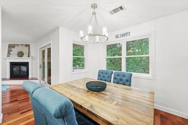 Dining room, Fireplace, Interior, Pendant Lights, Wood Texture Flooring