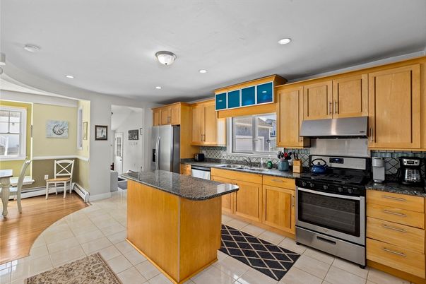 Dining room, Interior, Kitchen, Recessed Lighting, Stainless Steel Appliances, Wood Texture Flooring