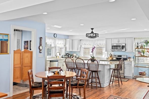 Dining room, Interior, Kitchen, Recessed Lighting, Stainless Steel Appliances, Wood Texture Flooring