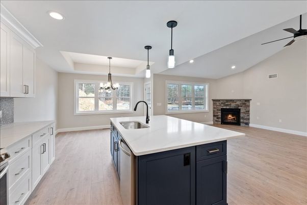 Chandelier, Fireplace, Interior, Kitchen, Pendant Lights, Recessed Lighting, Wood Texture Flooring
