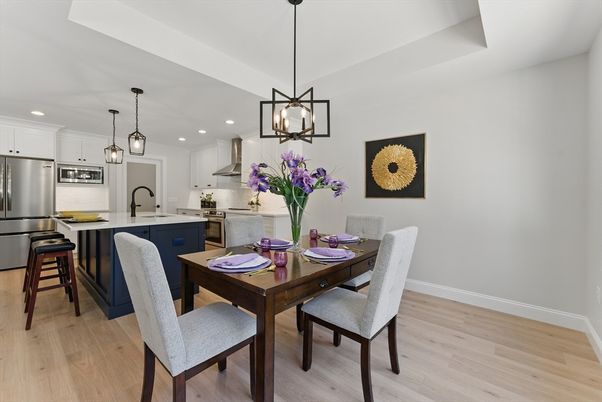 Dining room, Interior, Kitchen, Pendant Lights, Recessed Lighting, Stainless Steel Appliances, Wood Texture Flooring