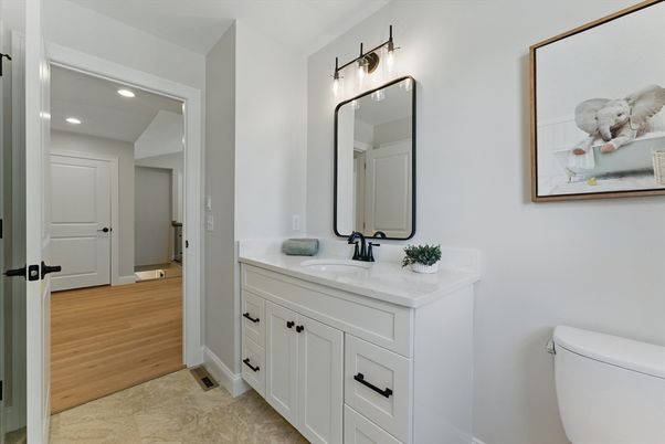 Bathroom, Dual Sink Vanities, Interior, Recessed Lighting, Wood Texture Flooring
