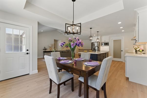 Dining room, Interior, Kitchen, Pendant Lights, Recessed Lighting, Stainless Steel Appliances, Wood Texture Flooring