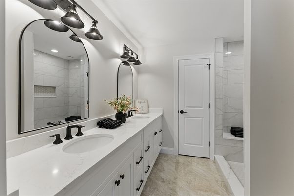 Bathroom, Dual Sink Vanities, Glass Shower, Interior, Marble Walls, Recessed Lighting