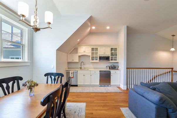 Dining room, Interior, Kitchen, Pendant Lights, Recessed Lighting, Stainless Steel Appliances, Wood Texture Flooring
