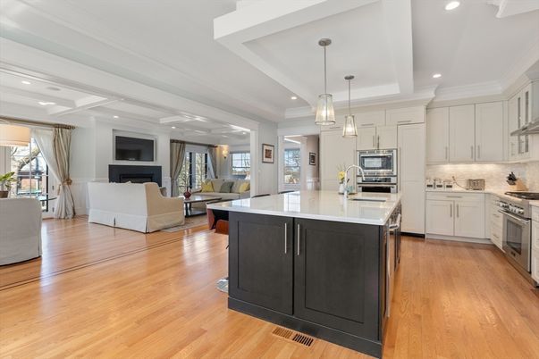 Fireplace, Interior, Kitchen, Living room, Pendant Lights, Recessed Lighting, Stainless Steel Appliances, Wood Texture Flooring