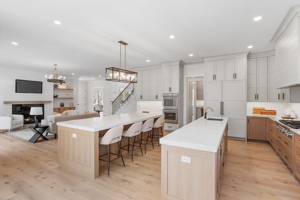 Chandelier, Dining room, Fireplace, Interior, Kitchen, Living room, Pendant Lights, Recessed Lighting, Stainless Steel Appliances, Wood Texture Flooring