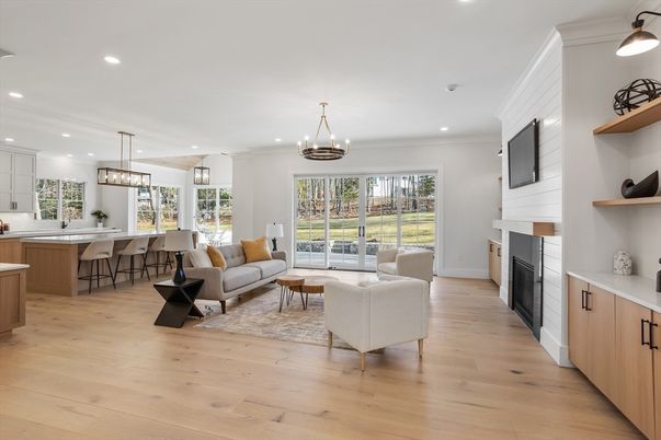Chandelier, Fireplace, Interior, Living room, Pendant Lights, Recessed Lighting, Wood Texture Flooring