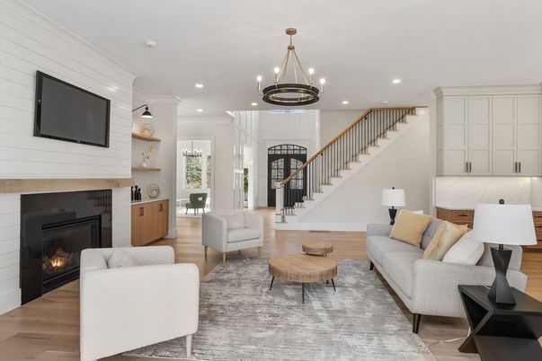 Chandelier, Fireplace, Interior, Living room, Pendant Lights, Recessed Lighting, Wood Texture Flooring