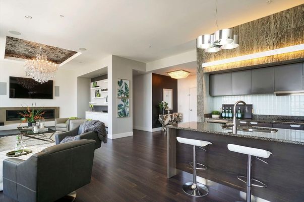 Chandelier, Fireplace, Interior, Kitchen, Living room, Recessed Lighting, Stainless Steel Appliances, Wood Texture Flooring