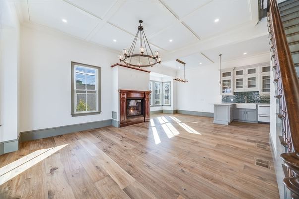 Chandelier, Empty room, Fireplace, Interior, Kitchen, Pendant Lights, Recessed Lighting, Wood Texture Flooring