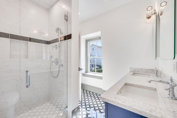 Bathroom, Dual Sink Vanities, Glass Shower, Interior, Marble Walls, Recessed Lighting