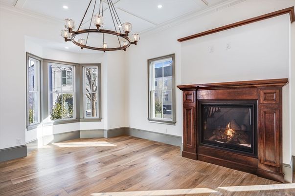 Chandelier, Empty room, Fireplace, Interior, Pendant Lights, Recessed Lighting, Wood Texture Flooring