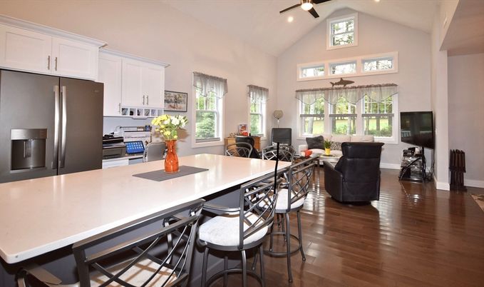 Dining room, Interior, Kitchen, Living room, Recessed Lighting, Stainless Steel Appliances, Wood Texture Flooring