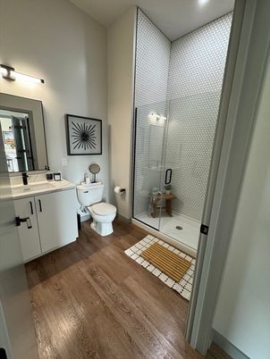 Bathroom, Glass Shower, Interior, Recessed Lighting, Wood Texture Flooring