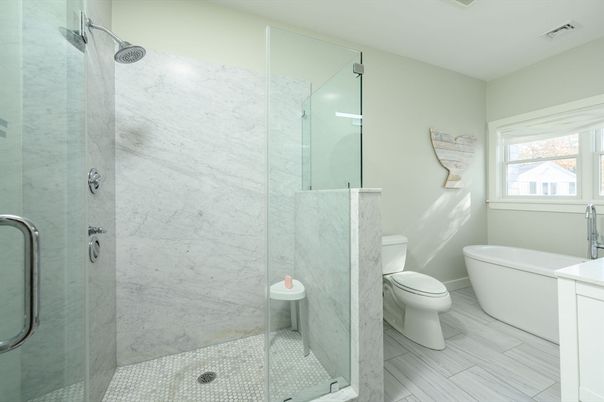 Bathroom, Glass Shower, Interior, Marble Walls, Wood Texture Flooring