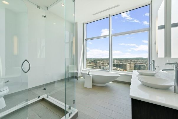 Bathroom, Free Standing Baths, Glass Shower, Interior, Recessed Lighting, Wood Texture Flooring