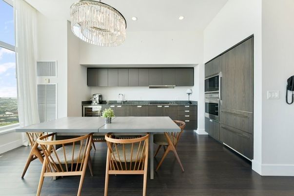 Chandelier, Dining room, Interior, Kitchen, Recessed Lighting, Stainless Steel Appliances, Wood Texture Flooring