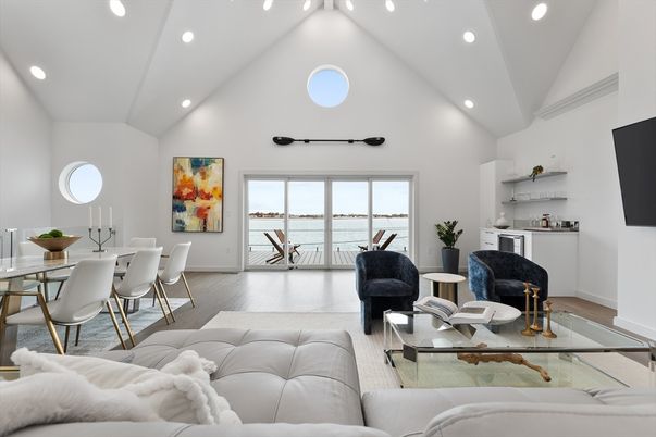 Dining room, Fireplace, Interior, Living room, Recessed Lighting, Water, Wood Texture Flooring