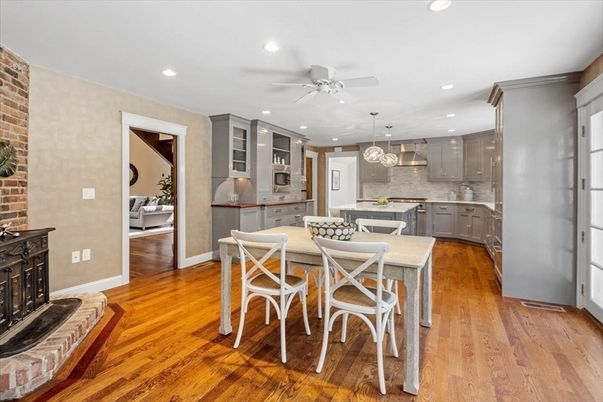 Dining room, Interior, Kitchen, Pendant Lights, Recessed Lighting, Stainless Steel Appliances, Stone Walls, Wood Texture Flooring