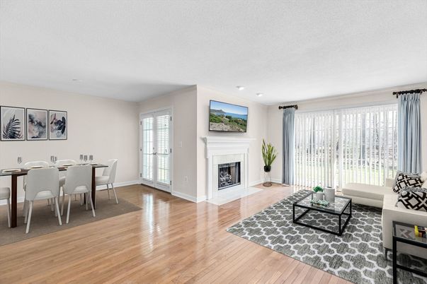 Dining room, Fireplace, Interior, Living room, Recessed Lighting, Wood Texture Flooring