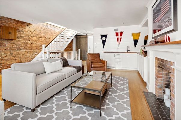 Fireplace, Interior, Living room, Recessed Lighting, Stone Walls, Wood Texture Flooring