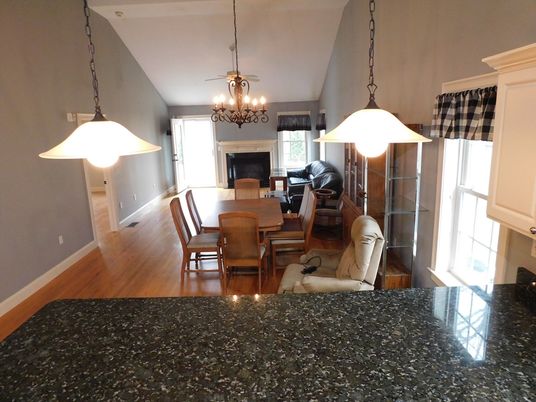 Dining room, Fireplace, Interior, Living room, Pendant Lights, Wood Texture Flooring