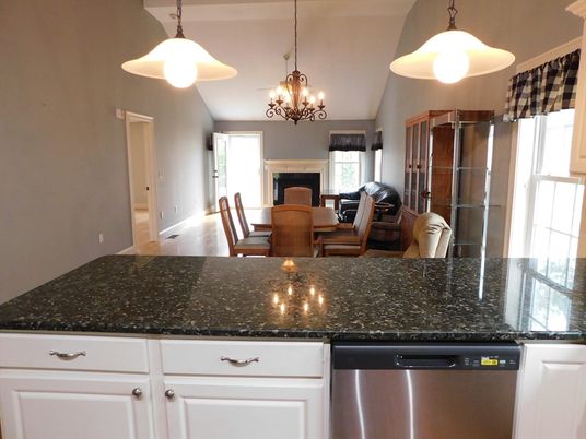 Chandelier, Dining room, Fireplace, Interior, Kitchen, Pendant Lights, Wood Texture Flooring