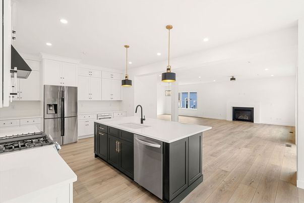 Fireplace, Interior, Kitchen, Pendant Lights, Recessed Lighting, Stainless Steel Appliances, Wood Texture Flooring