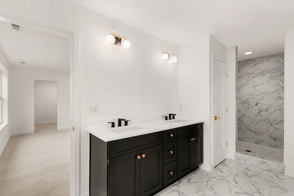 Bathroom, Dual Sink Vanities, Interior, Marble, Marble Walls, Recessed Lighting