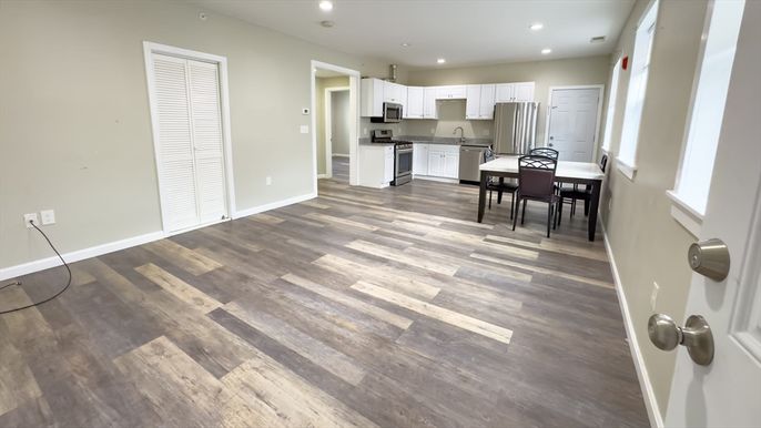 Dining room, Interior, Kitchen, Recessed Lighting, Stainless Steel Appliances, Wood Texture Flooring