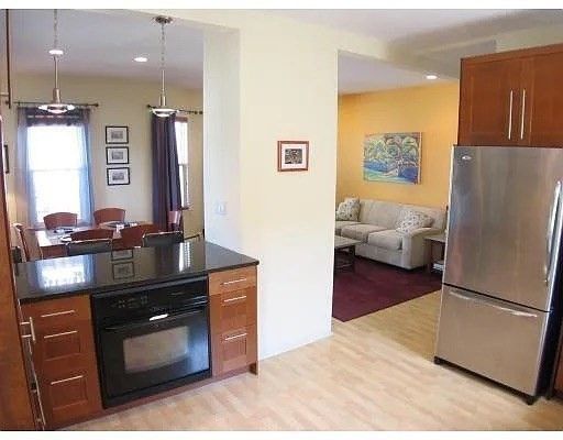 Dining room, Interior, Kitchen, Living room, Pendant Lights, Recessed Lighting, Stainless Steel Appliances, Wood Texture Flooring