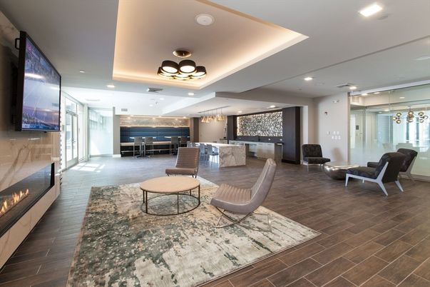 Chandelier, Dining room, Fireplace, Interior, Living room, Pendant Lights, Recessed Lighting, Wood Texture Flooring