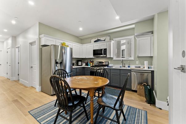 Dining room, Interior, Kitchen, Recessed Lighting, Stainless Steel Appliances, Wood Texture Flooring
