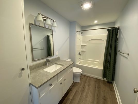 Bathroom, Dual Sink Vanities, Interior, Recessed Lighting, Wood Texture Flooring
