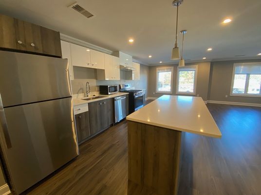 Interior, Kitchen, Pendant Lights, Recessed Lighting, Stainless Steel Appliances, Wood Texture Flooring