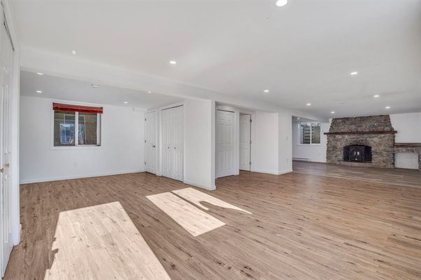 Empty room, Fireplace, Interior, Recessed Lighting, Wood Texture Flooring