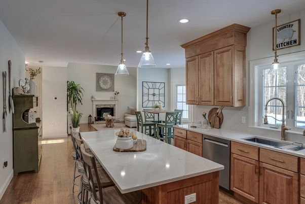 Dining room, Fireplace, Interior, Kitchen, Pendant Lights, Recessed Lighting, Stainless Steel Appliances, Wood Texture Flooring