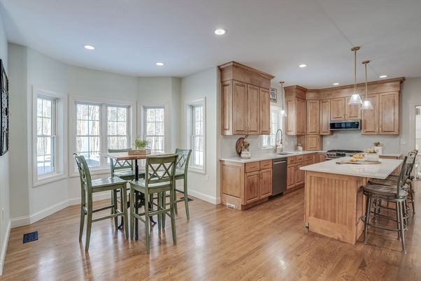Dining room, Interior, Kitchen, Pendant Lights, Recessed Lighting, Stainless Steel Appliances, Wood Texture Flooring