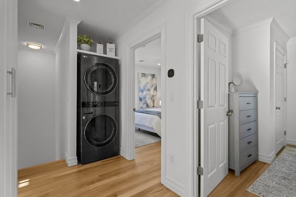Bedroom, Interior, Recessed Lighting, Utility Closets, Washer, Wood Texture Flooring