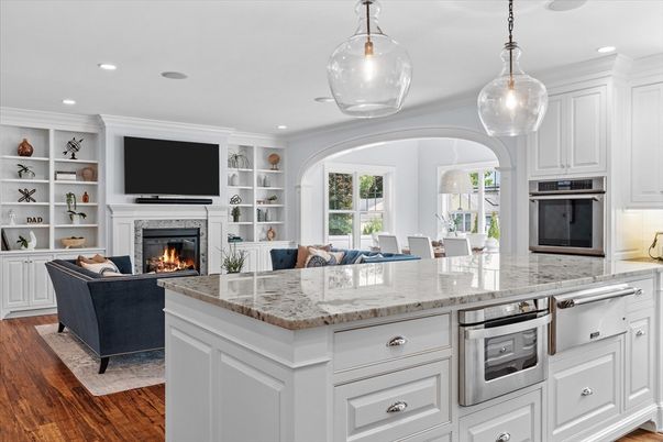 Dining room, Fireplace, Interior, Kitchen, Living room, Pendant Lights, Recessed Lighting, Stainless Steel Appliances, Wood Texture Flooring
