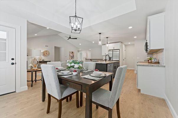 Dining room, Interior, Kitchen, Pendant Lights, Recessed Lighting, Stainless Steel Appliances, Wood Texture Flooring