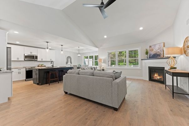 Fireplace, Interior, Kitchen, Living room, Pendant Lights, Recessed Lighting, Stainless Steel Appliances, Wood Texture Flooring