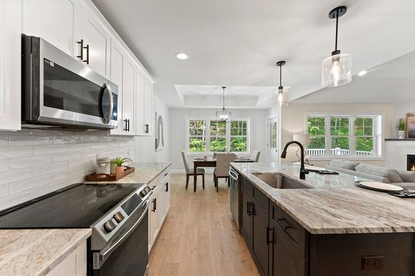 Dining room, Fireplace, Interior, Kitchen, Pendant Lights, Recessed Lighting, Stainless Steel Appliances, Wood Texture Flooring