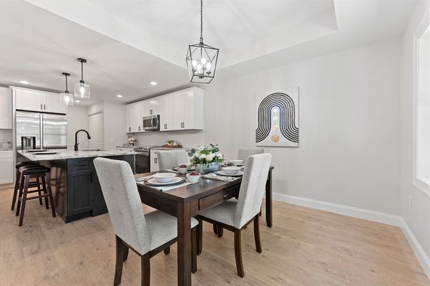 Dining room, Interior, Kitchen, Pendant Lights, Recessed Lighting, Stainless Steel Appliances, Wood Texture Flooring