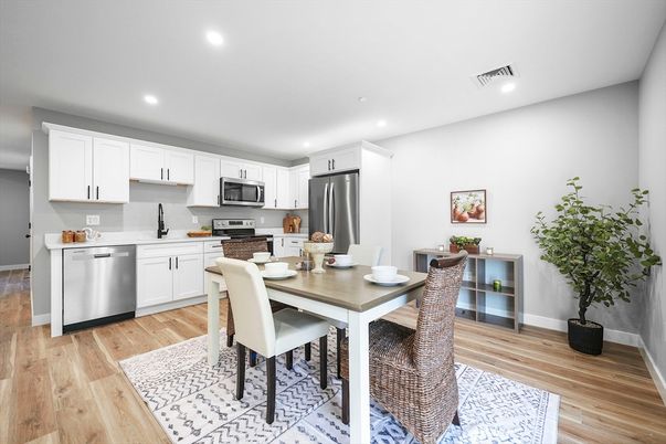 Dining room, Interior, Kitchen, Recessed Lighting, Stainless Steel Appliances, Wood Texture Flooring