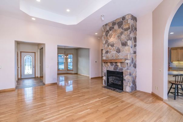 Empty room, Fireplace, Interior, Pendant Lights, Recessed Lighting, Wood Texture Flooring