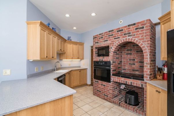 Fireplace, Interior, Kitchen, Recessed Lighting, Stone Walls